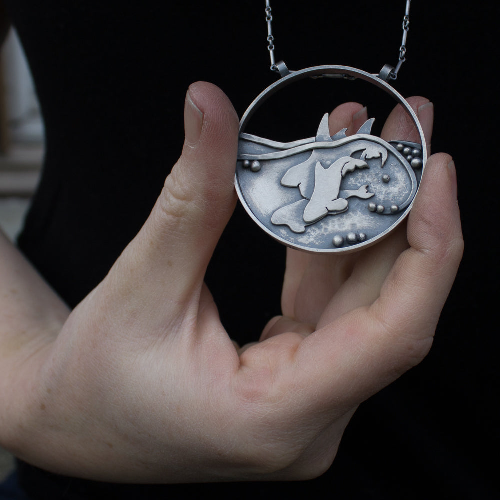 Family of Killer Whales Medallion